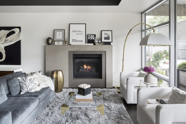 Comfortable modern living room in an urban condo: Interior design by Savvy Design Group